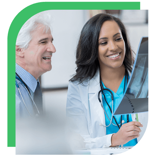 Doctor looking at x-ray with patient