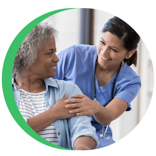 female doctor with senior female patient